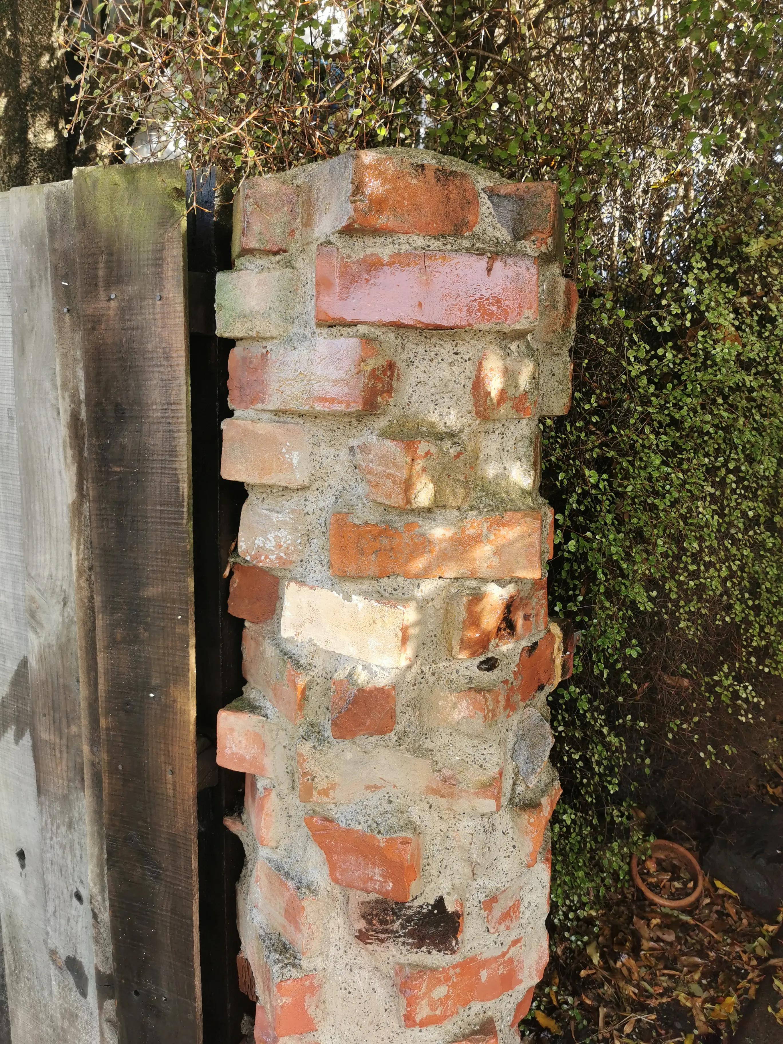 Lichen removal — brick gate pillar, after professional exterior cleaning in Canterbury