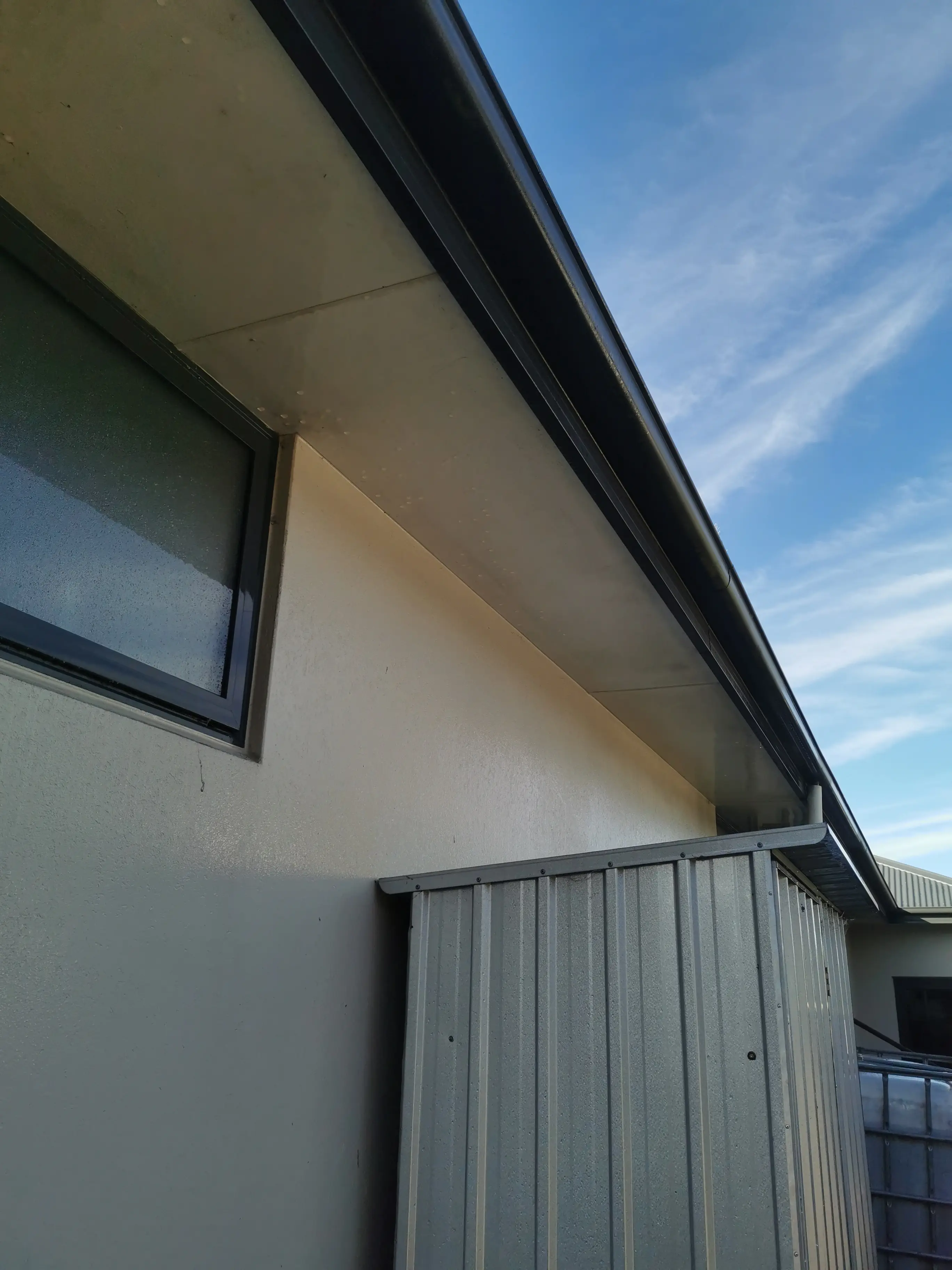 Mould removal — soffits & eaves, before professional exterior cleaning